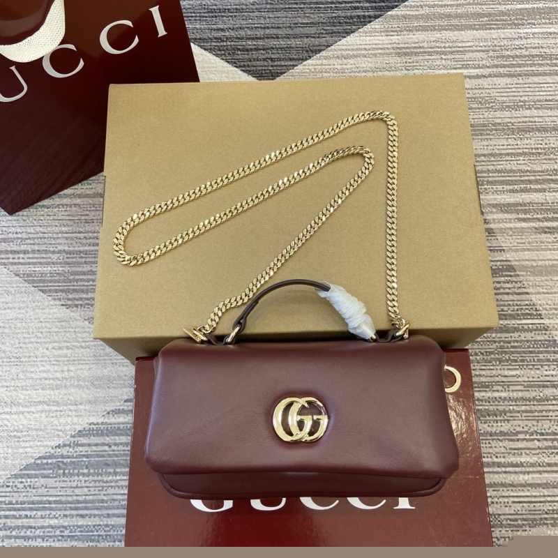 G*u*i top handle bags